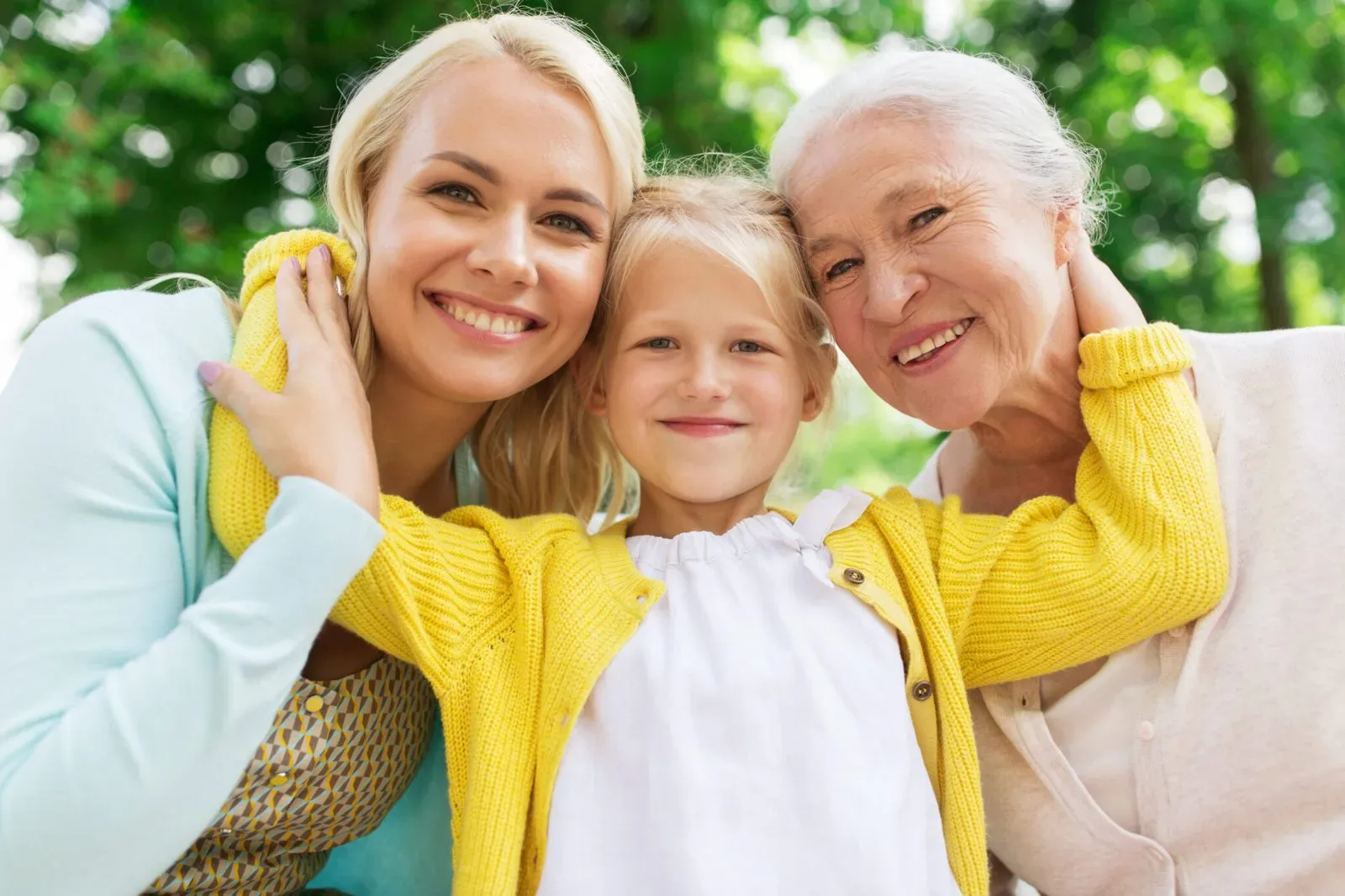 Three generations smiling together